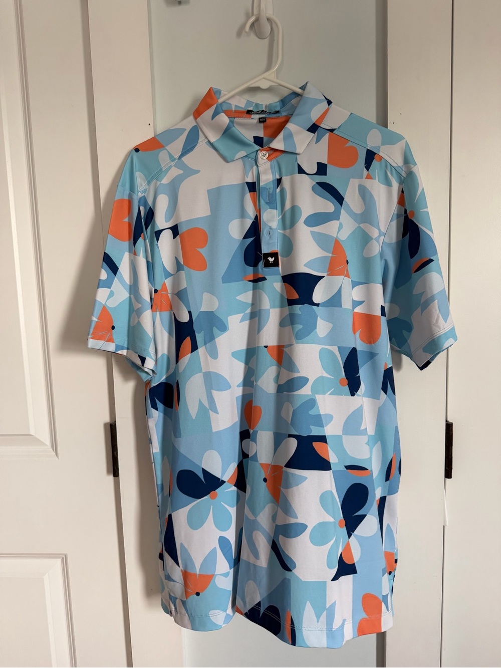 Bad Birdie Blue Floral-Print Polo with Orange & Navy Accents